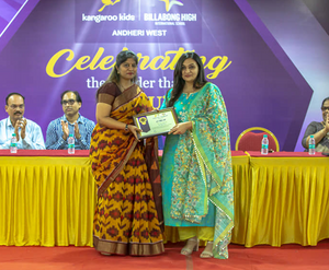 Pooja Kava Chauhan receiving Award